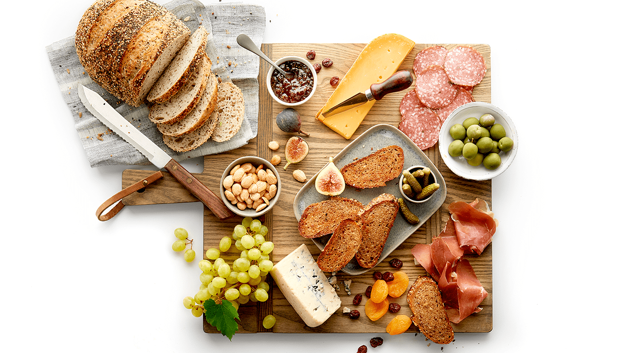 Various food items on cutting board.